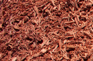 close up of red dyed mulch